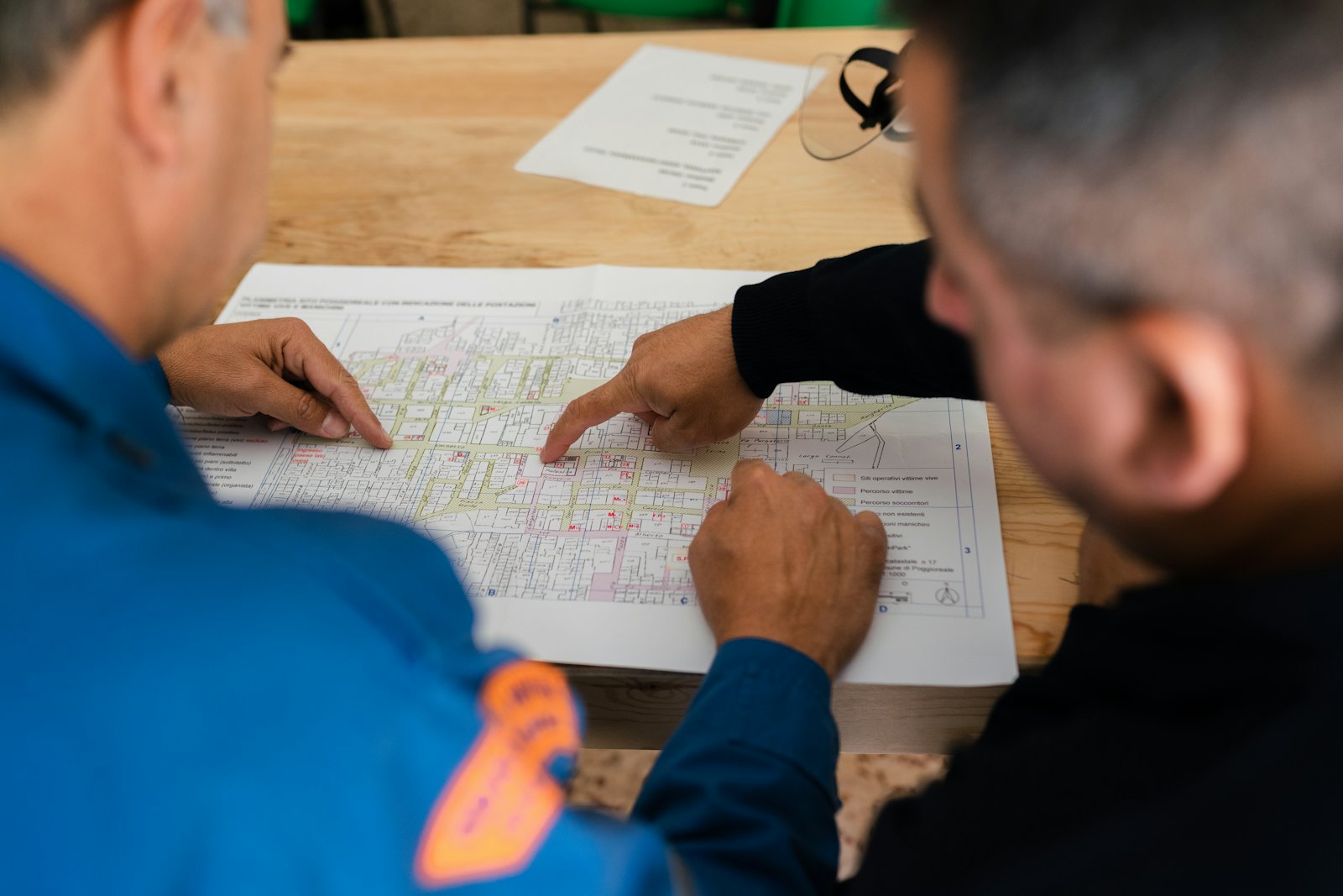 Estimators reviewing construction plans together